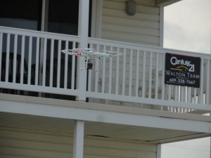 A drone flies in front of a property listed for sale at the south end of Ocean City.