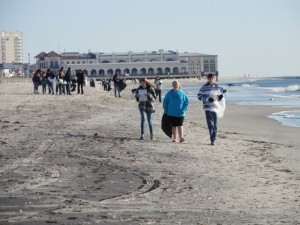 Patience Weaver, Hannah Whelan and Michael Foglio, ninth-graders in Ocean City High School's Key Club, help with the Fall Beach Sweep on Saturday.