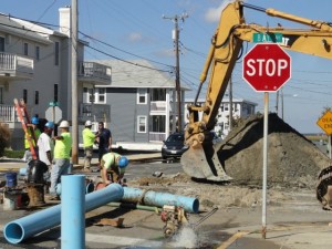 Construction crews install drainage equipment outside Frankie's on the Bay on Friday, Oct. 17.