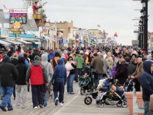 Crowds of families fill the Ocean City Boardwalk on Saturday, March 28.