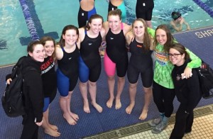 Ocean City High School's individual state championship swimmers: Coach Kate Merz, Gabby Breazeale, Maggie Wallace, Amanda Nunan, Ryann Styer, Aly Chain, Amber Glenn and coach Brittany O'Donnell.