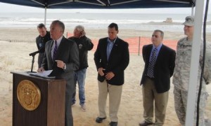 State Department of Environmental Protection Commissioner Bob Martin speaks about a $57.6 million beach replenishment project for Ocean City, Strathmere and Sea Isle City on Friday, April 17. Congressman Frank LoBiondo, DEP spokesman Bob Considine and Army Corps of Engineers Lt. Col. Michael Bliss are in the background.