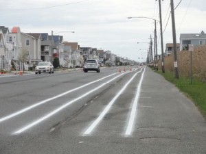 The new bicycle lanes on West Avenue in Ocean City are buffered on each side to separate bikes from traffic and from parked cars.