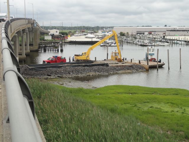 Ocean City is spending $2.7 million on a plan to remove dredge material from a site near Roosevelt Boulevard by barge and truck — with a landing area under the 34th Street Bridge.