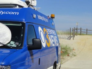 News vans descend upon Ocean City for "man o' war' coverage.