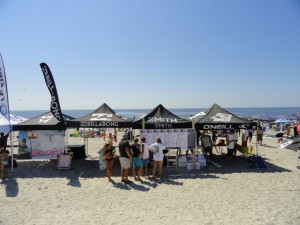 Competitors check the heat sheets for the Chip Miller Surf Fest contest.