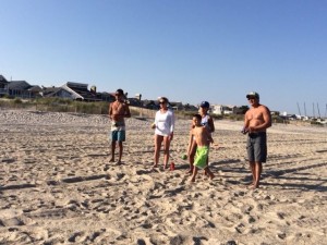 The Martinez family of Lemont, IL. plays bocce on the beach near 40th Street.