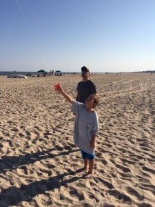 Jonathan Gricco of Bellmawr flys a kite with his nephew, Derek Wilson, 8, on the beach near 39th Street.