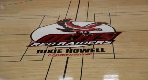The completed logo makes up the tipoff circle at Dixie Howell gymnasium at Ocean City High School. It features a stylized red-tailed hawk.