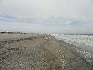 The wide beach at 58th Street holds up against a week of northeast winds.