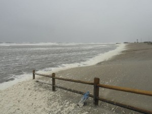 Storm surf from a northeast gale encroaches on a new split-rail fence at 57th Street in Ocean City less than a week after it was installed.