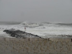 Storm surf batters the beach at Fifth Street just a month after a beach replenishment project there was completed.
