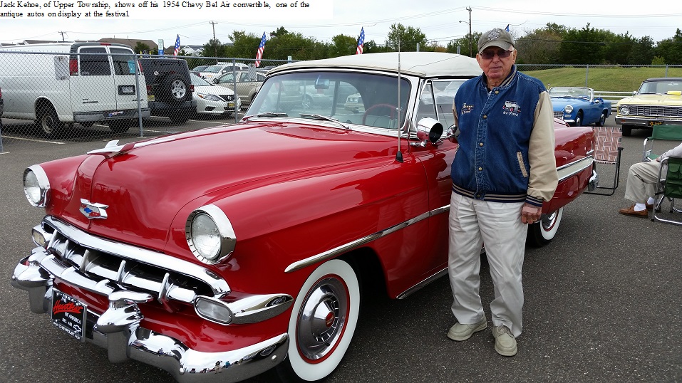 Jack Kehoe, of Upper Township, shows off his 1954 Chevy Bel Air convertible, one of the antique autos on display at the festival. 