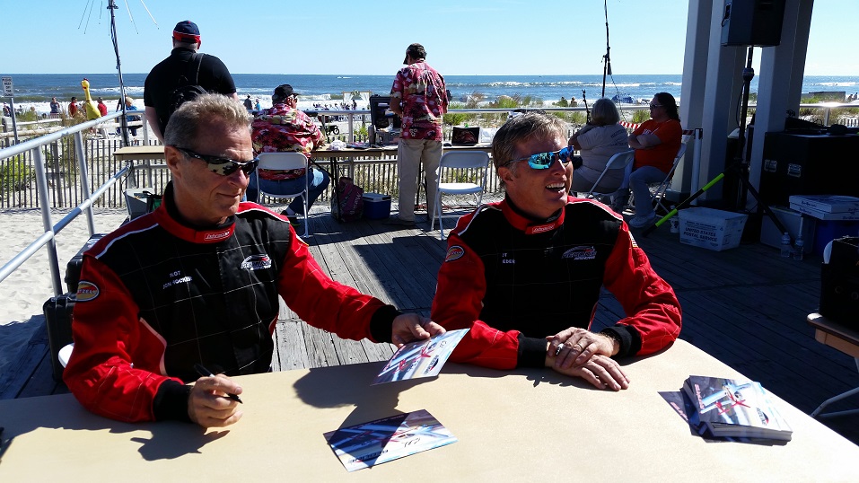 Pilots Jon Thocker, left, and Ken Rieder greeted fans and signed autographs after their performance.