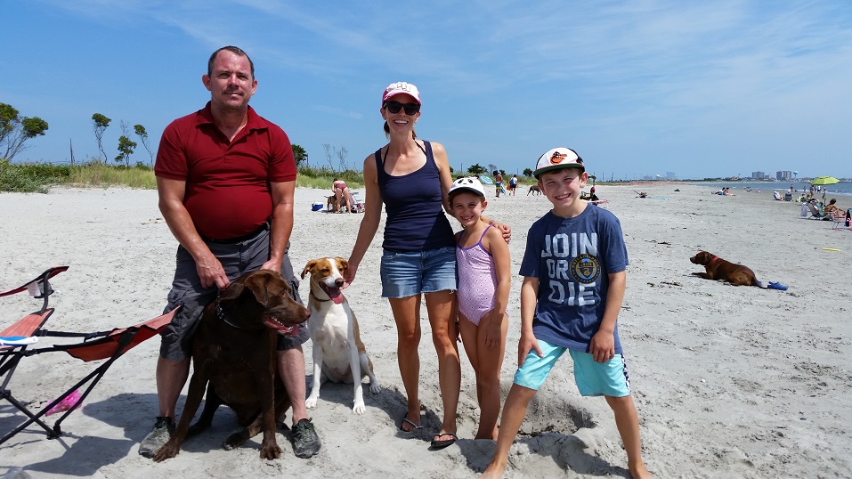 From left, Bill McKelvey, of Blackwood, joined his sister Danielle Teti, of Haddon Heights, and her children Gemma and Sam at Malibu Beach. McKelvey, with his Labrador retriever Hugo, and Teti, with her mixed breed Fergie, said they hope Ocean City will allow dogs on its beaches.