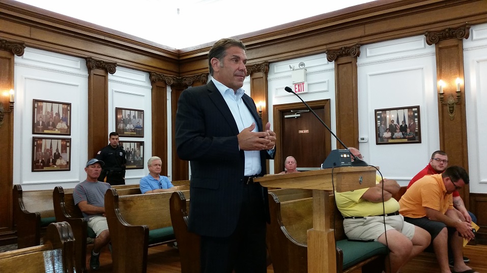 Keller Williams owner Paul Chiolo, pictured while addressing City Council over the summer, says his proposed office project will help to beautify the Ninth Street corridor.