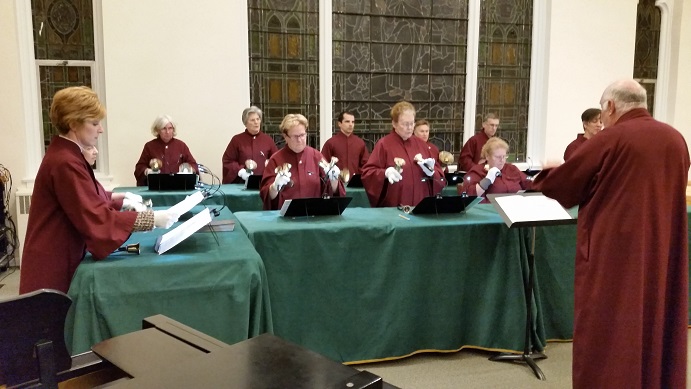 The white-gloved members of the Bell Choir of St. Peter's performed "Peal Con Brio."