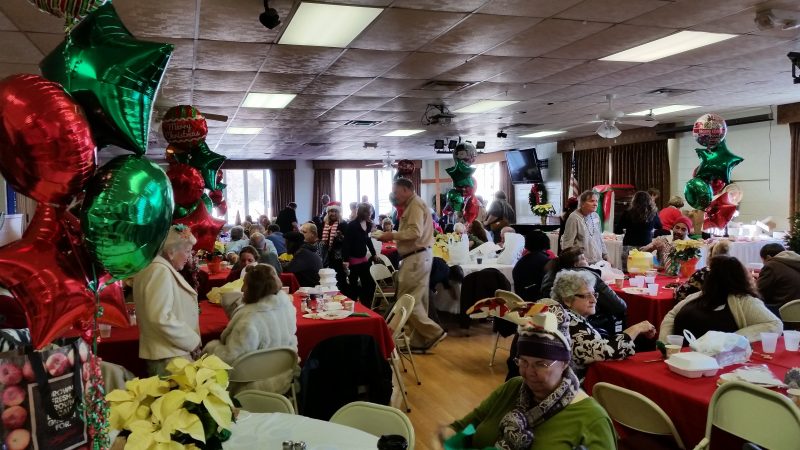 The festively decorated Fellowship Hall at St. Peter's United Methodist Church was packed with diners.