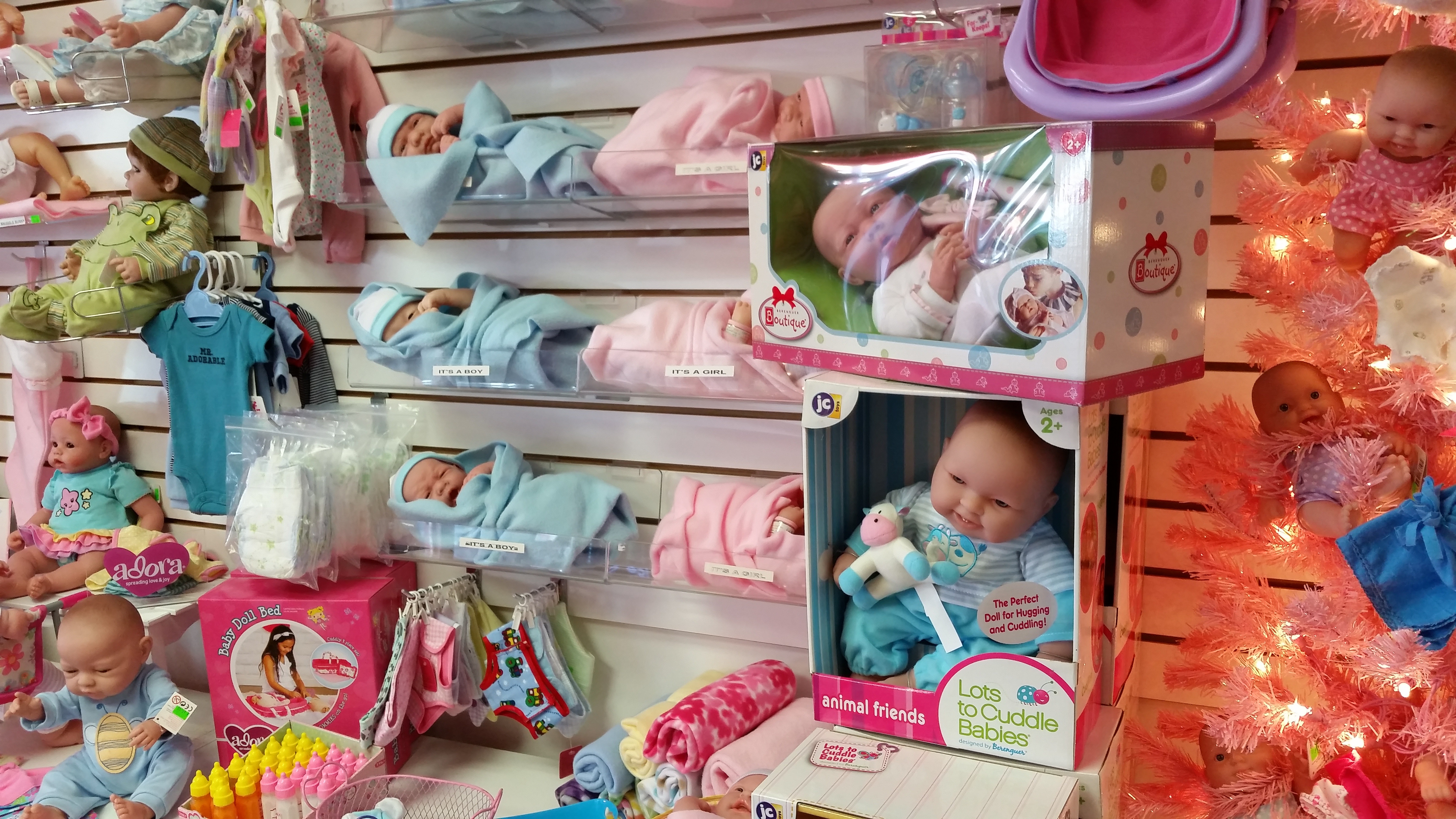The store features an array of baby dolls and accessories.