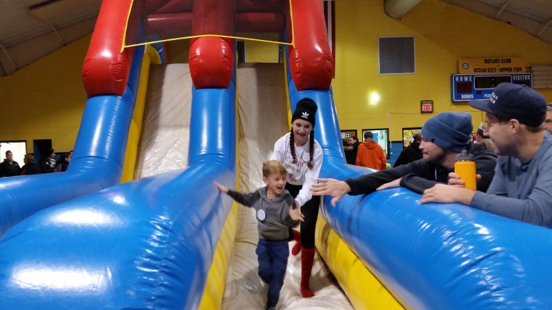 A big, inflatable slide inside the Sports and Civic Center was one of the popular attractions for children.