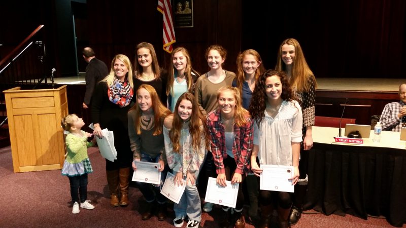 Members of the girls' soccer team were among the players who were honored by the school board for their achievements during the fall sports program.