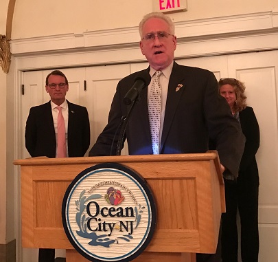 Cape May County Freeholder Brigadier General Jeffrey Pierson addresses the Ocean City Chamber of Commerce. Mayor Jay Gillian and Surrogate Judge Susan Sheppard look on.