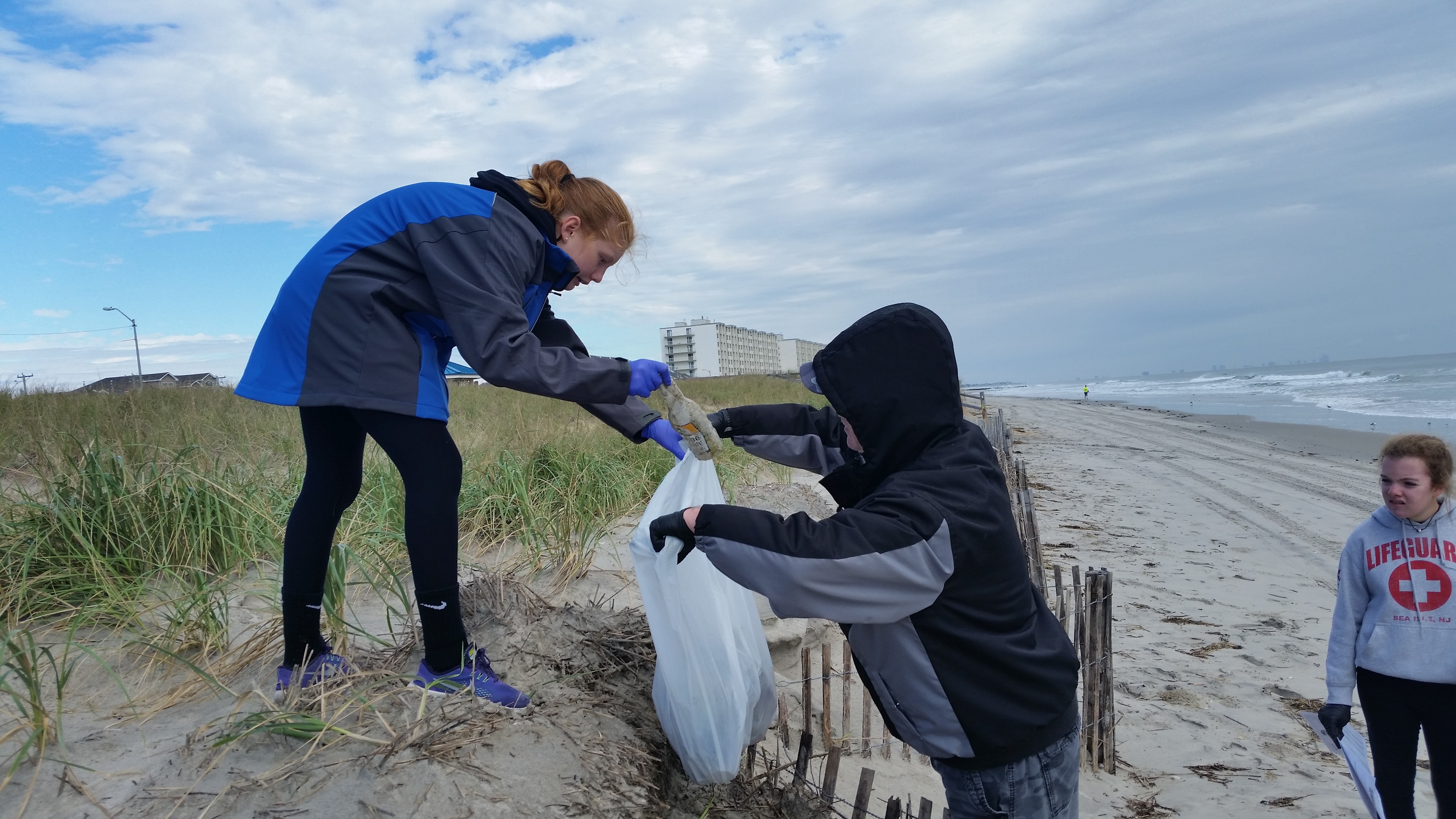 1.4 beach cleanup father and daughter | OCNJ Daily
