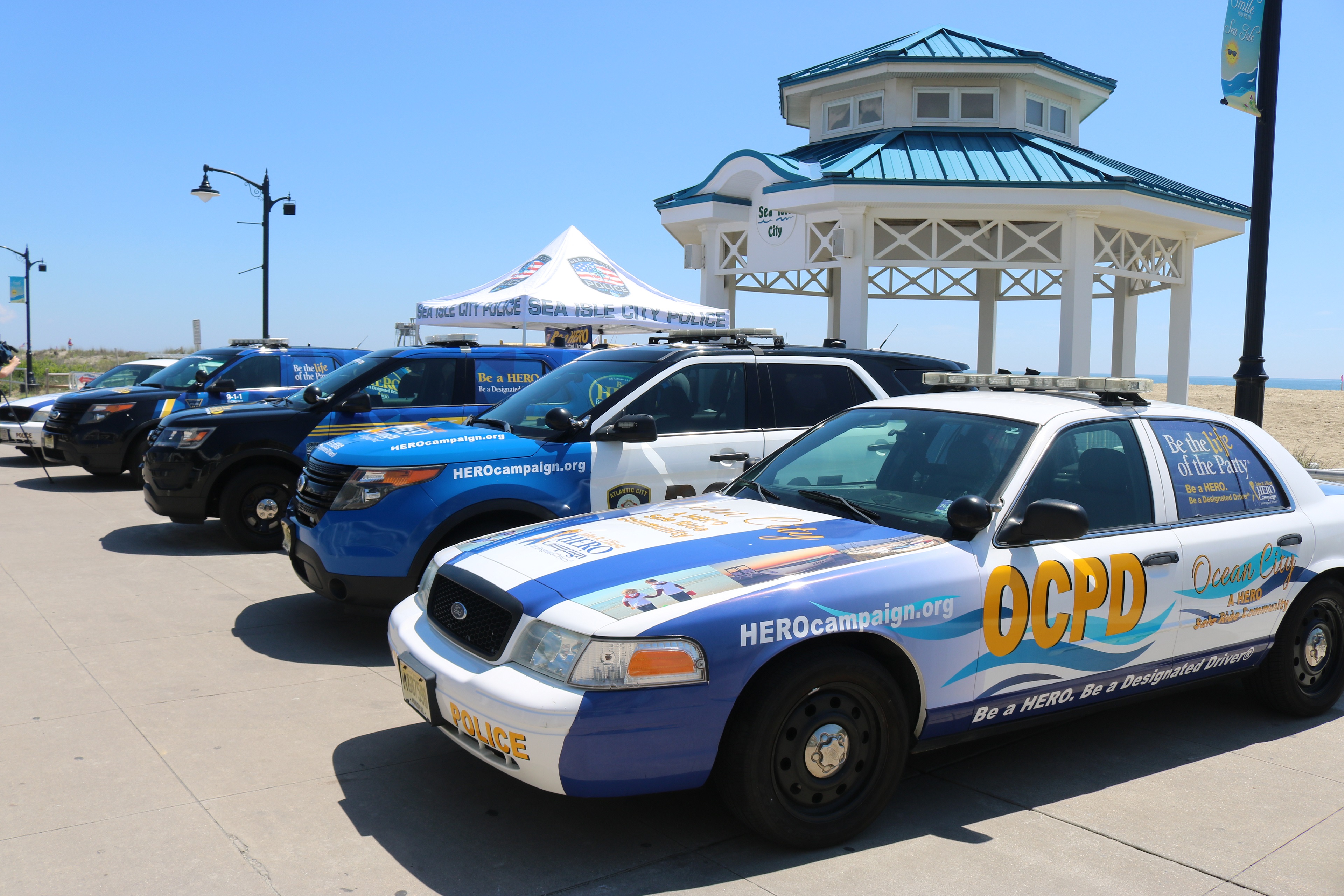 Police cars and SUVs lining Sea Isle City's Promenade in 2020, include...